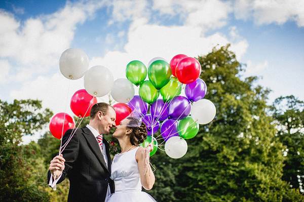 Wizard of Oz inspired wedding, red wedding shoes, colourful wedding, colourful wedding balloons, Candy Anthony, red petticoat, Photography by Ross Harvey