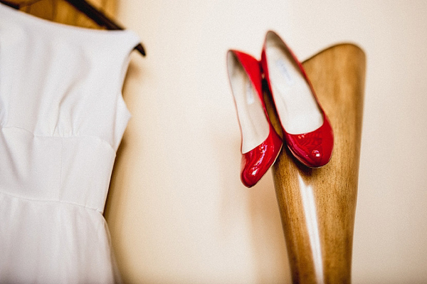 Wizard of Oz inspired wedding, red wedding shoes, colourful wedding, colourful wedding balloons, Candy Anthony, red petticoat, Photography by Ross Harvey