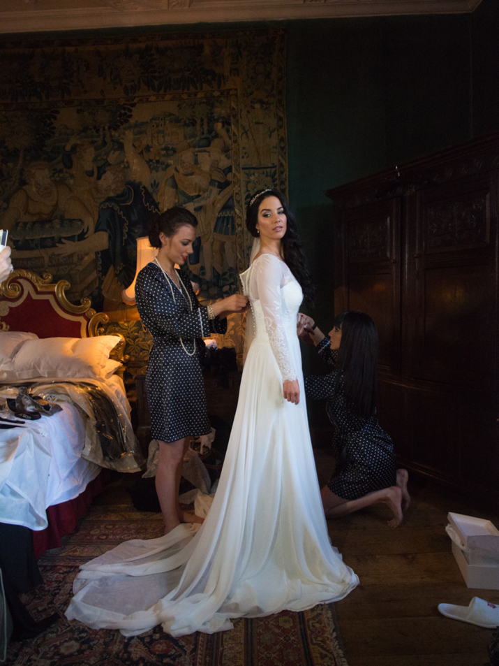 Elegant winter wonderland wedding // Bespoke wedding dress by Dana Bolton // Indigo Images wedding photography