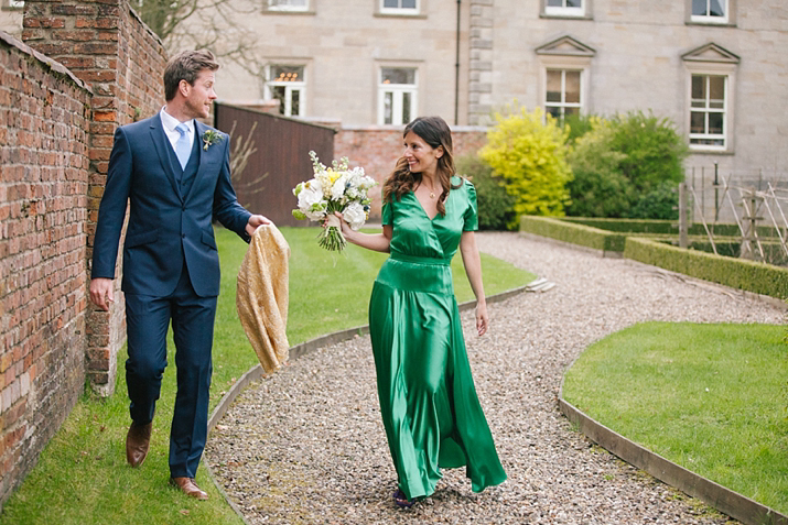 emerald green wedding dress, green wedding dress, purple wedding shoes, eshot hall, northumberland weddings, vanessa adams photography, green and gold wedding