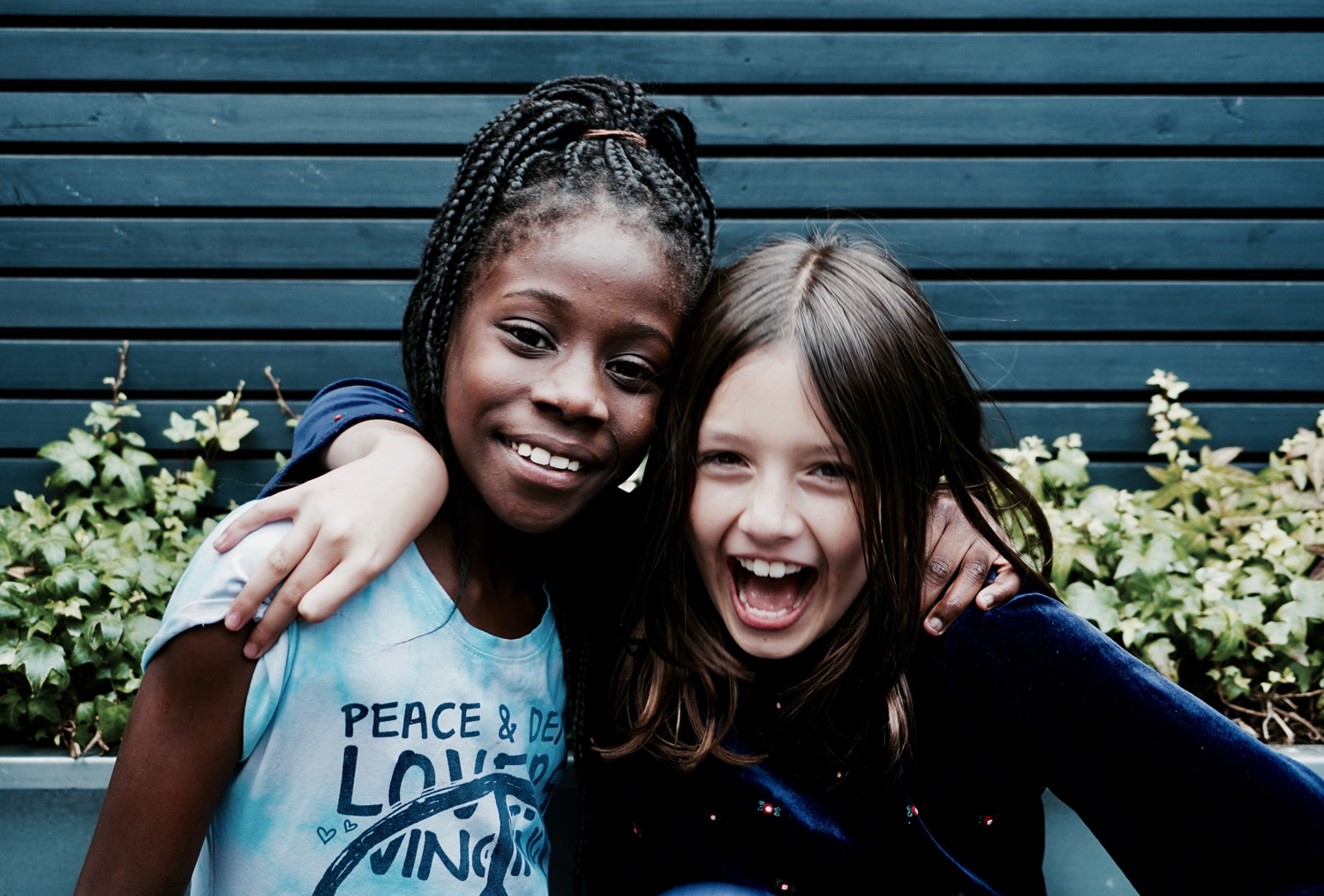 Lily at her leaving party with friend Astou